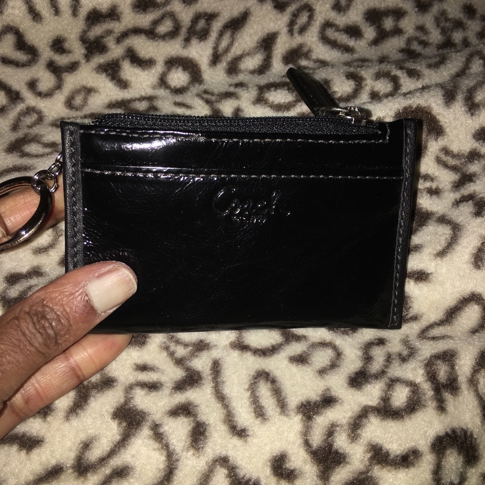 NWT Coach black patent leather mini skiny.